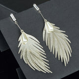 Long Dangling Earrings with a Pearl